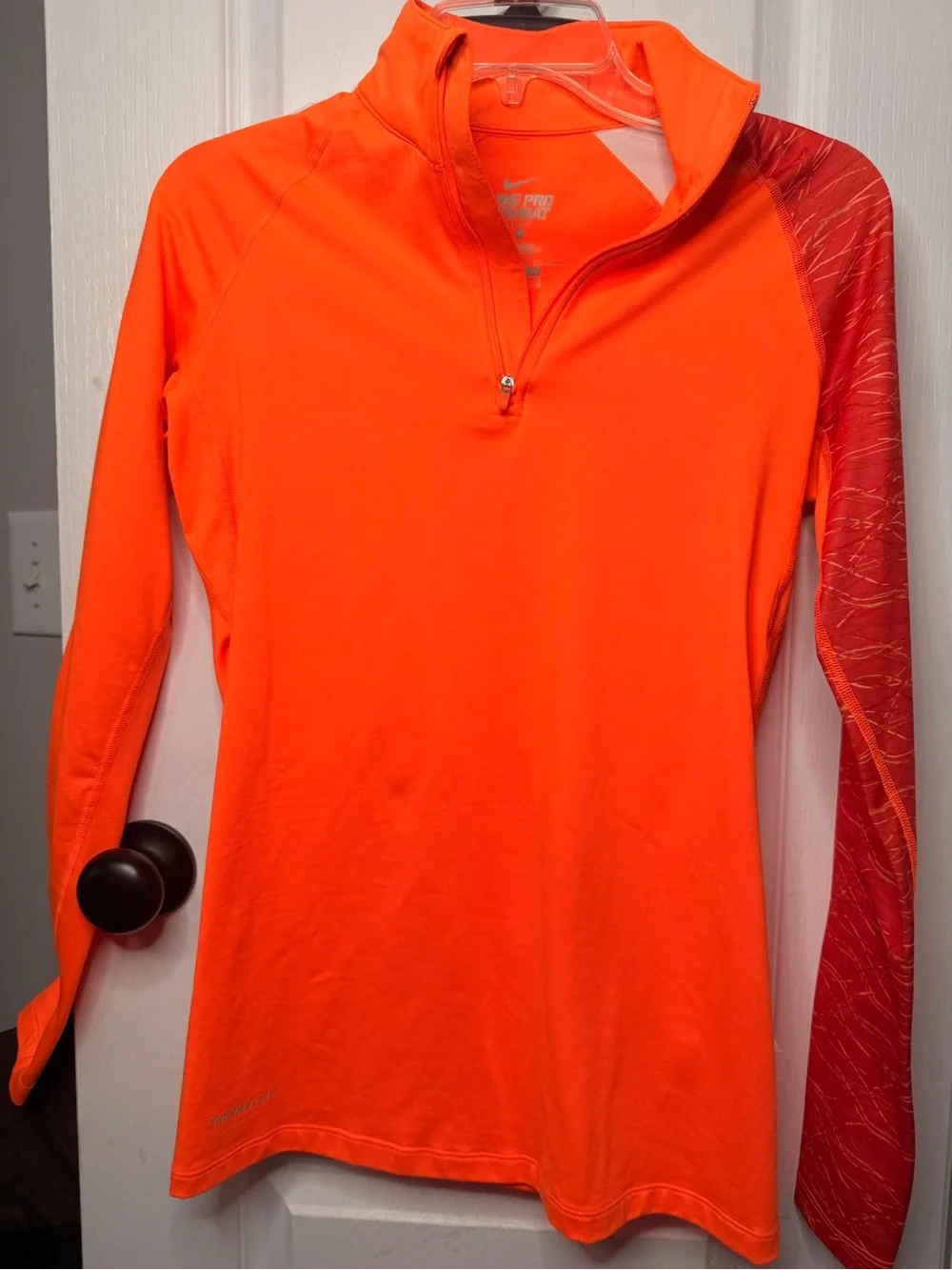 Nike Women’s Long-Sleeve Quarter-Zip Performance pullover- Neon Orange